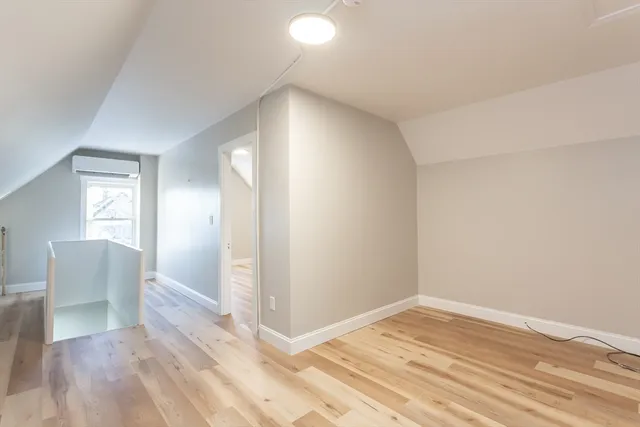 a view of a balcony with chairs