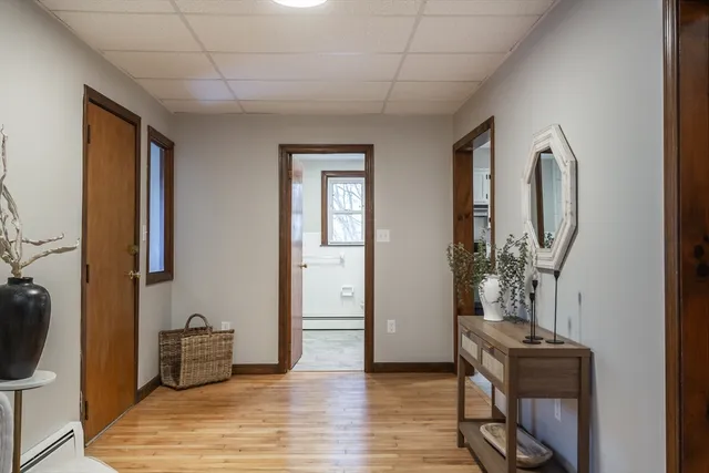 a view of a livingroom with furniture and front door