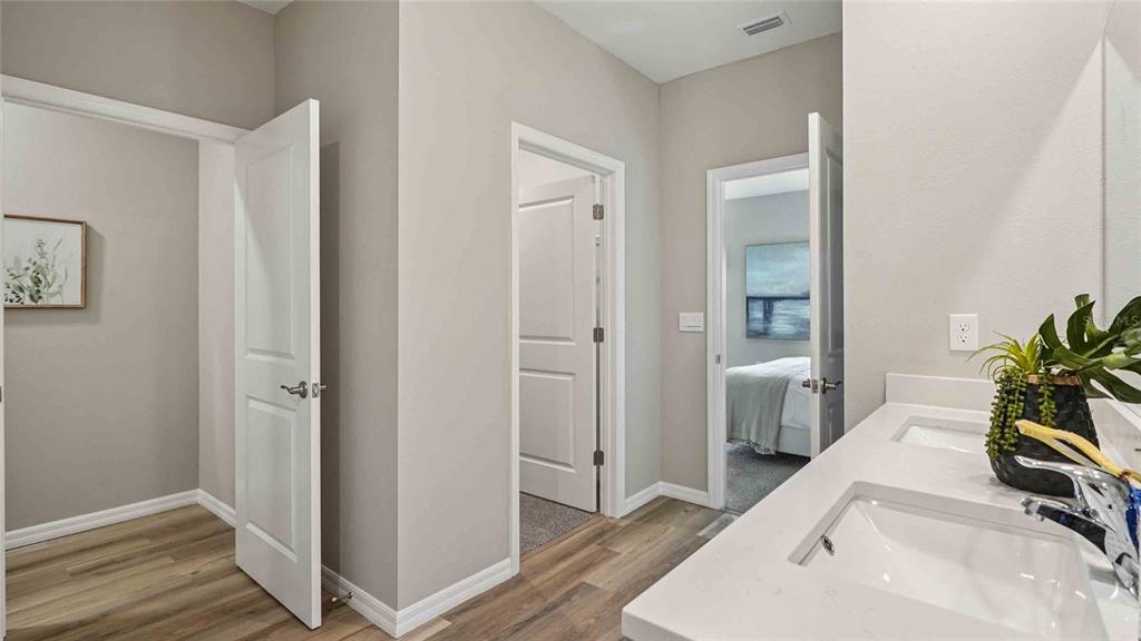 4623 Kona Circle Spring Hill, FL 34608 - Photo 14 of 25 a room with a bed and a hallway