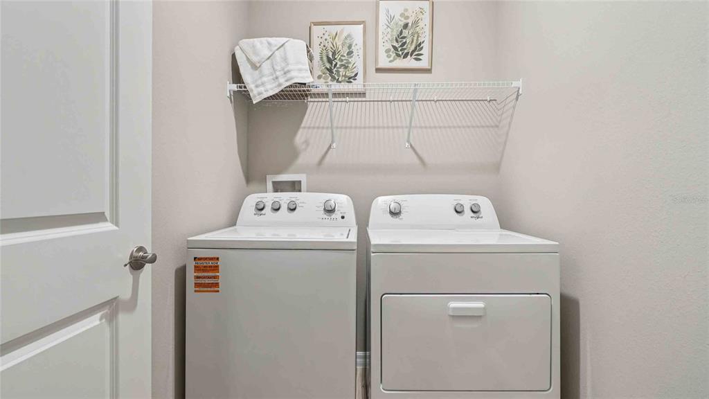 4623 Kona Circle Spring Hill, FL 34608 - Photo 19 of 25 a utility room with dryer and washer