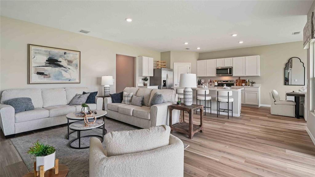 4623 Kona Circle Spring Hill, FL 34608 - Photo 9 of 25 a living room with furniture and a wooden floor
