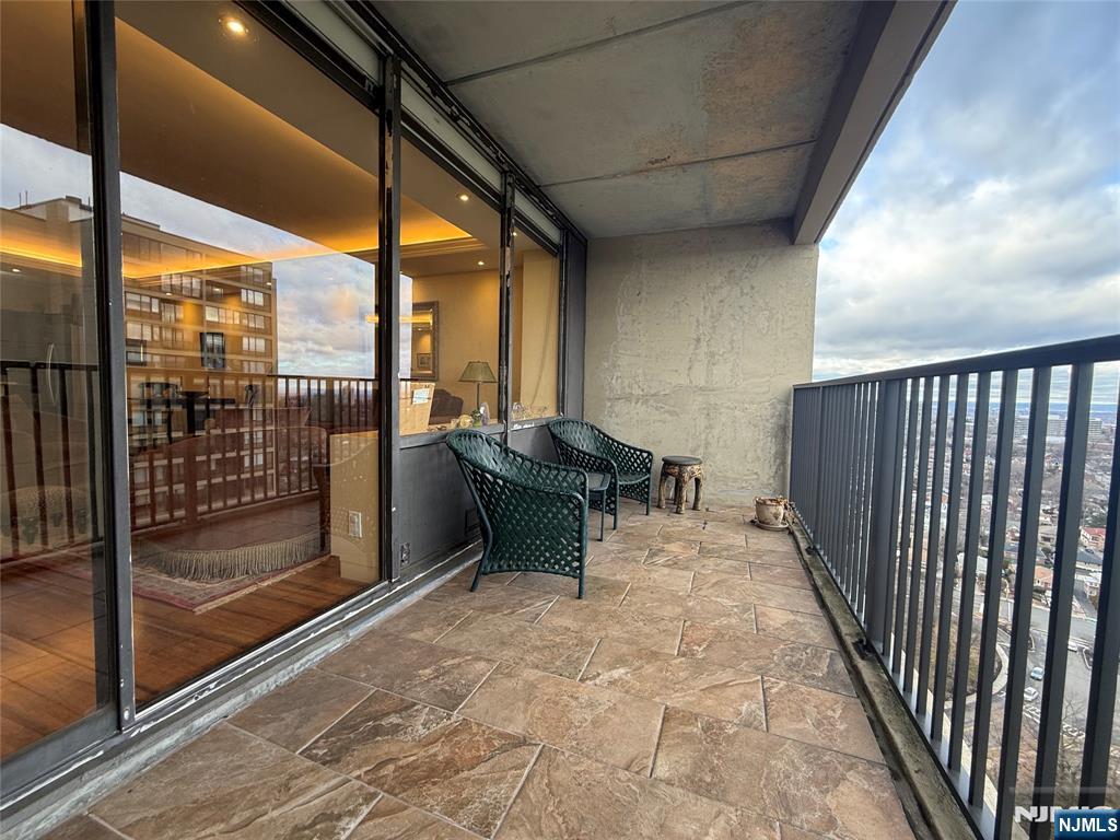 5 Horizon Road, Unit 2504 Fort Lee, NJ 07024 - Photo 22 of 41 a balcony with furniture