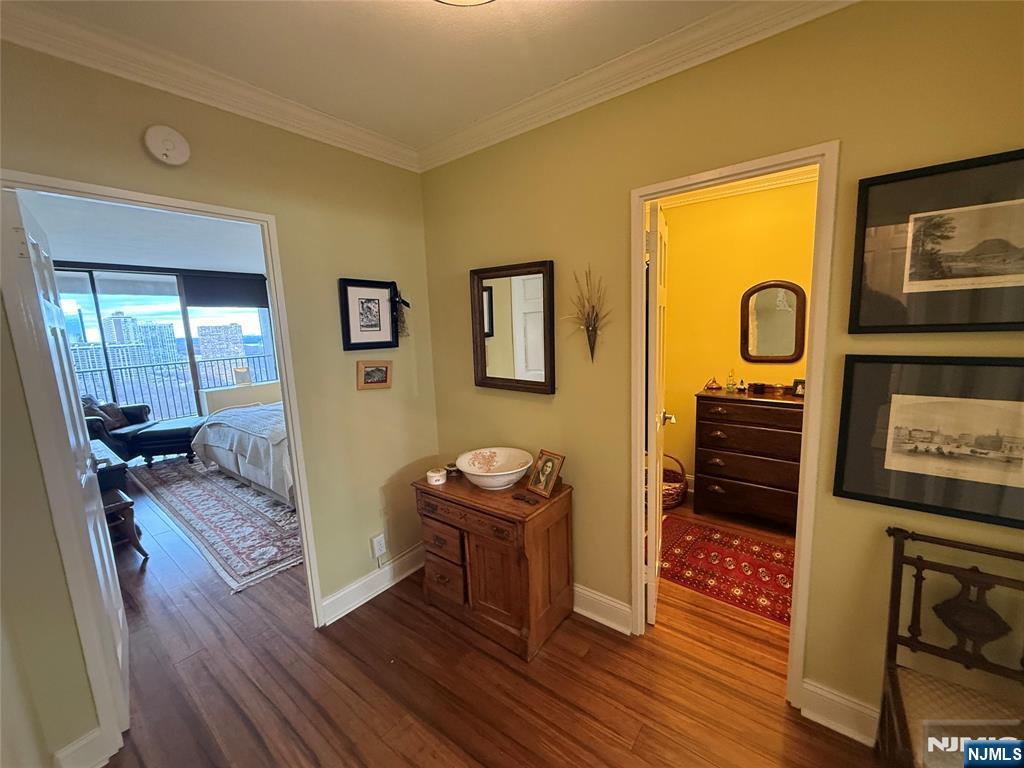 5 Horizon Road, Unit 2504 Fort Lee, NJ 07024 - Photo 31 of 41 a living room with furniture and a mirror