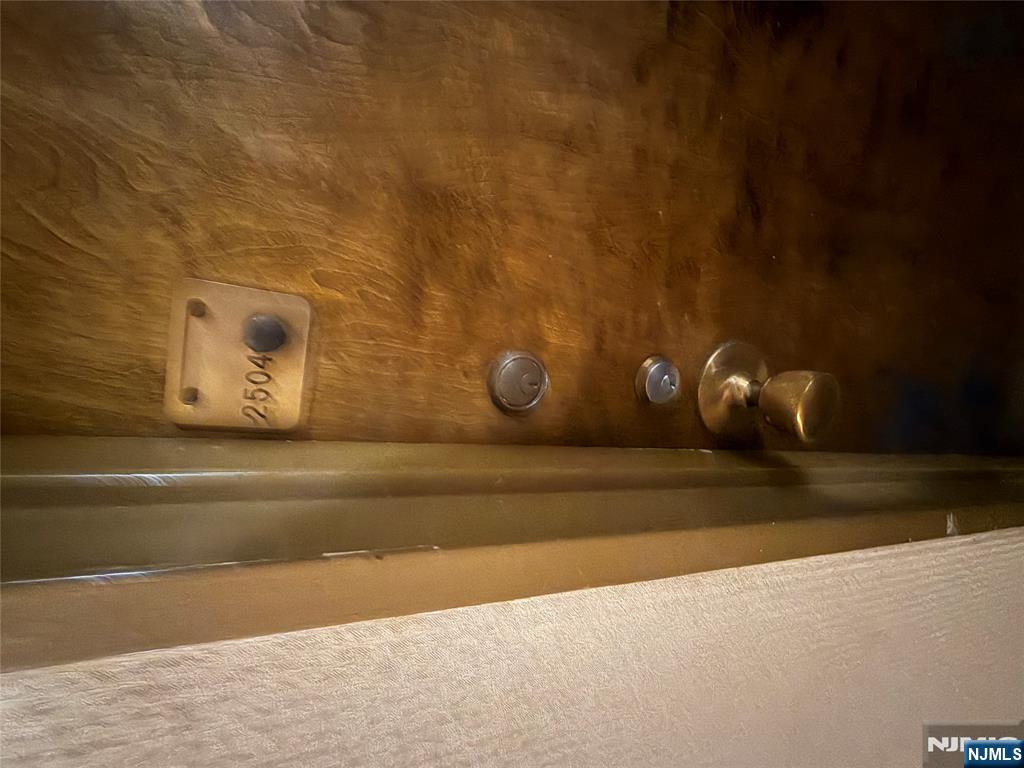 5 Horizon Road, Unit 2504 Fort Lee, NJ 07024 - Photo 10 of 41 a bathroom with a shower