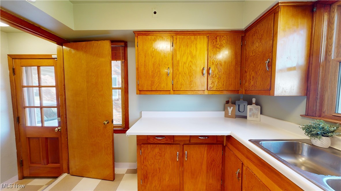 22581 Chardon Road Euclid, OH 44117 - Photo 9 of 34 Kitchen featuring sink