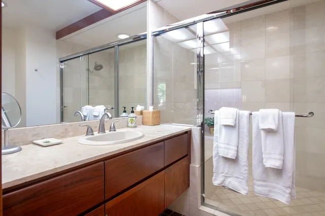 a bathroom with a sink and mirror