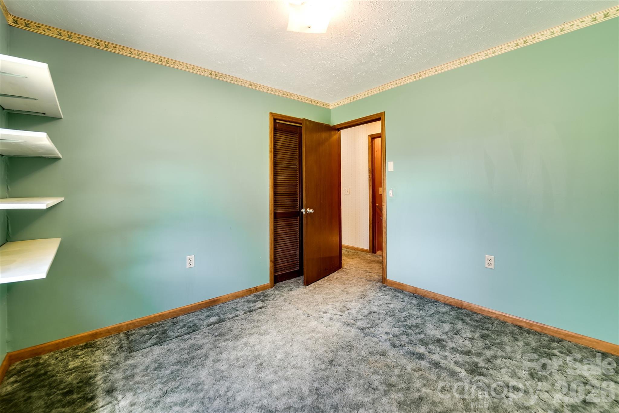 21 Queen Street Sylva, NC 28779 - Photo 12 of 45 a view of an empty room