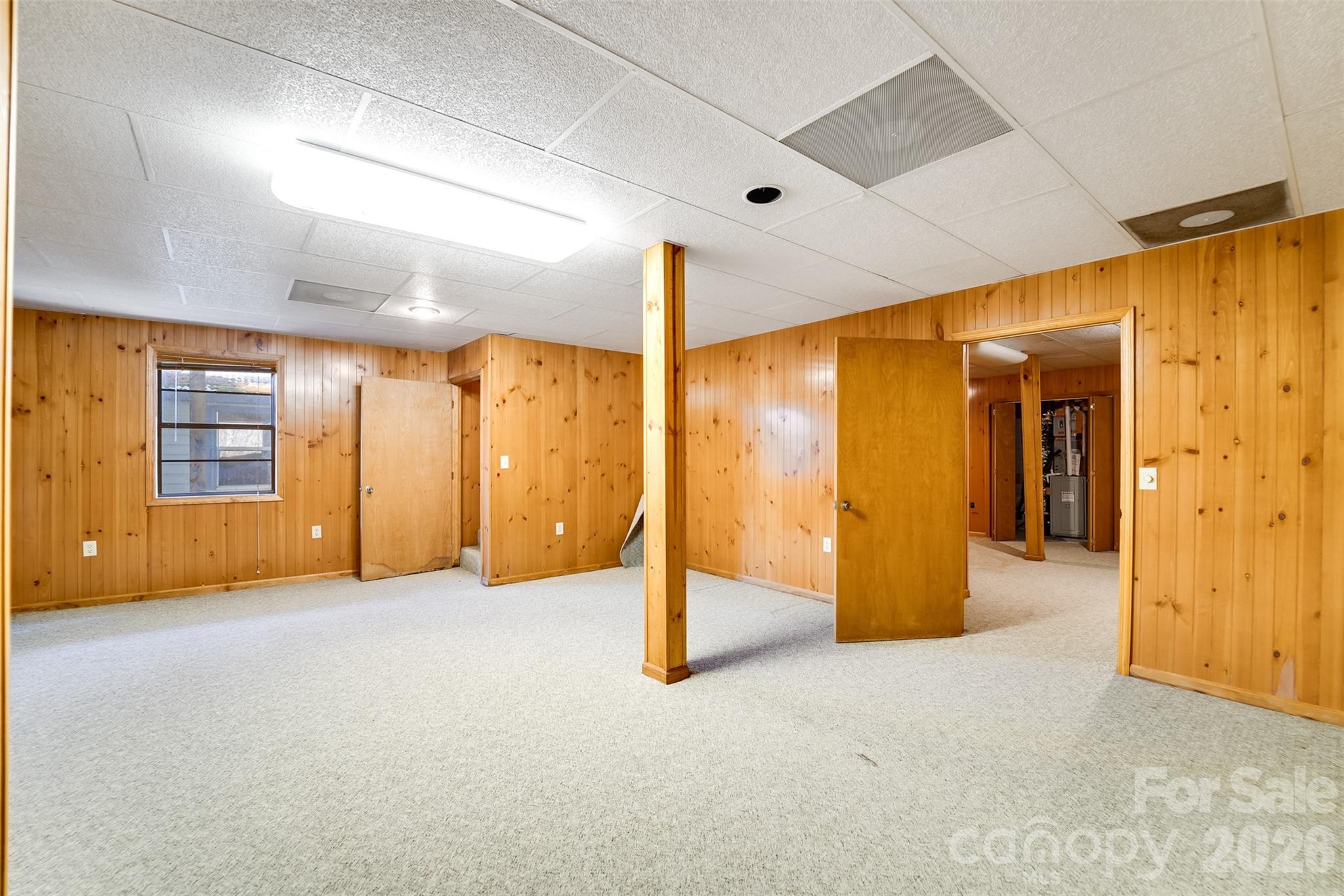 21 Queen Street Sylva, NC 28779 - Photo 20 of 45 a view of an empty room with glass door