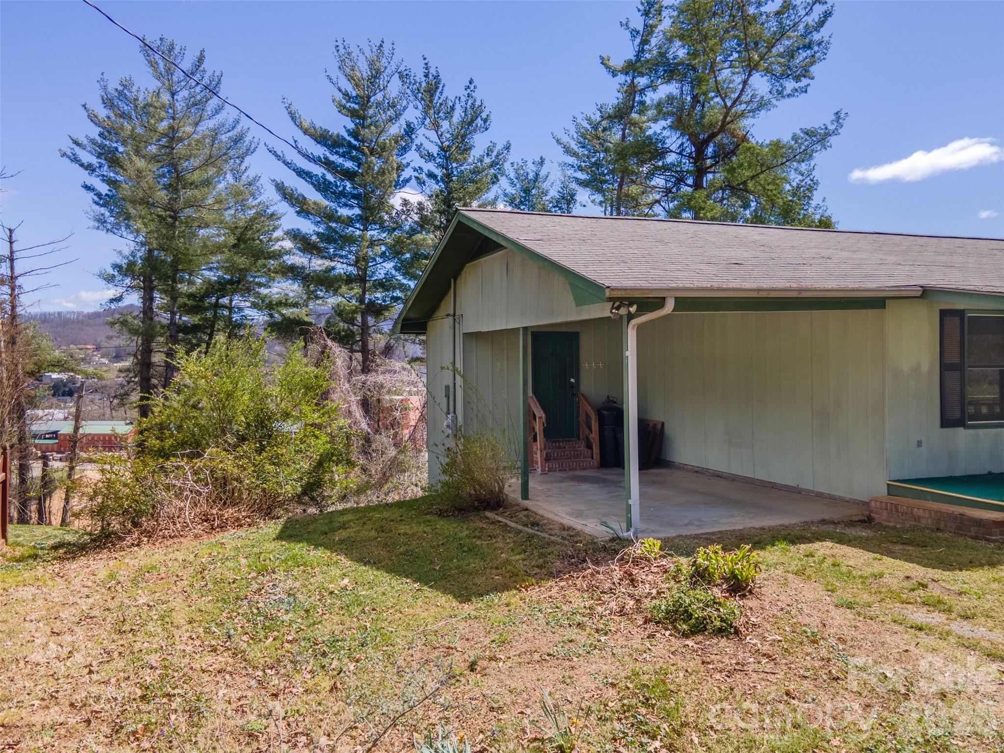 21 Queen Street Sylva, NC 28779 - Photo 23 of 45 a view of a house with a tree