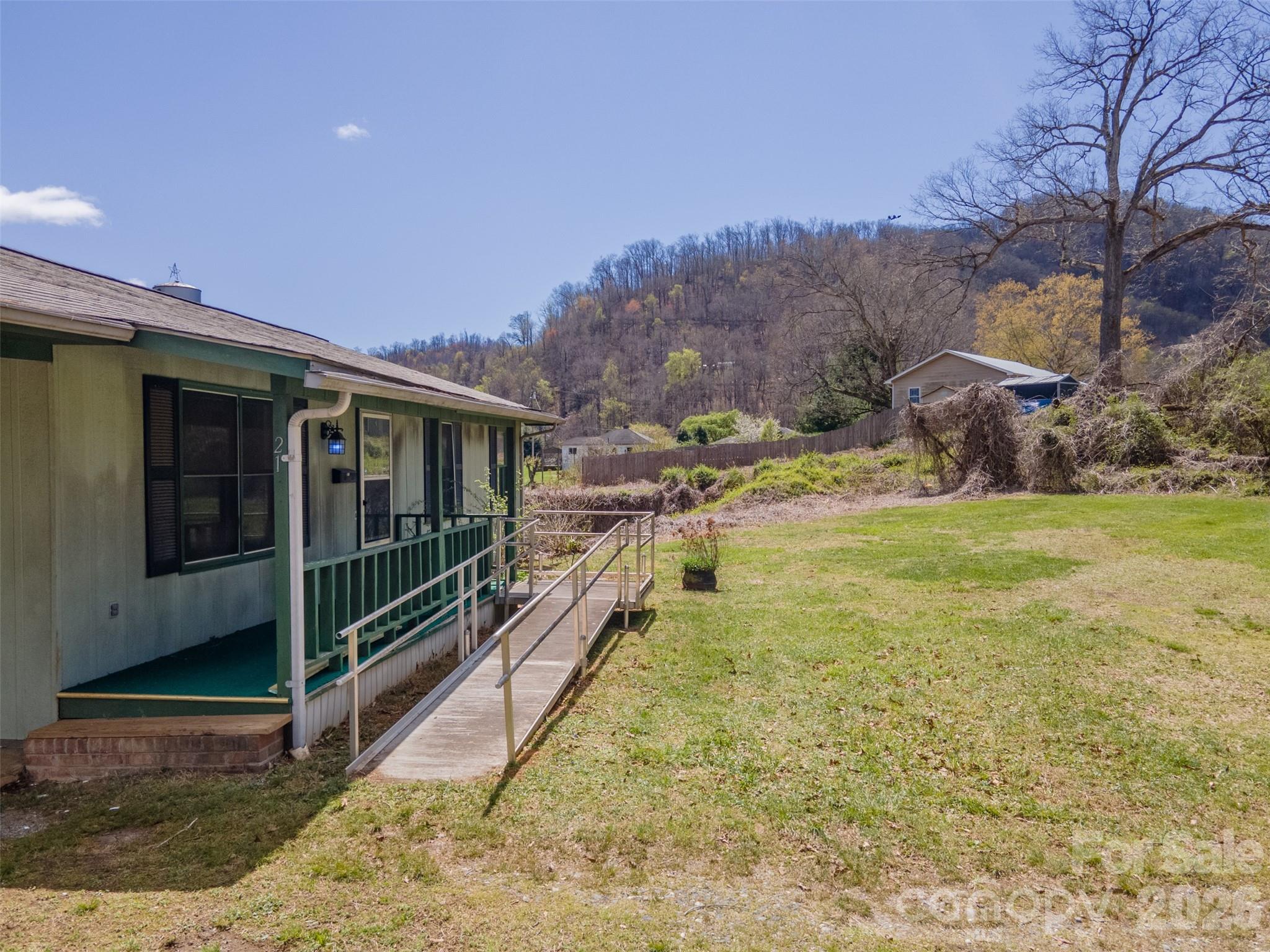 21 Queen Street Sylva, NC 28779 - Photo 24 of 45 a view of swimming pool with an outdoor seating