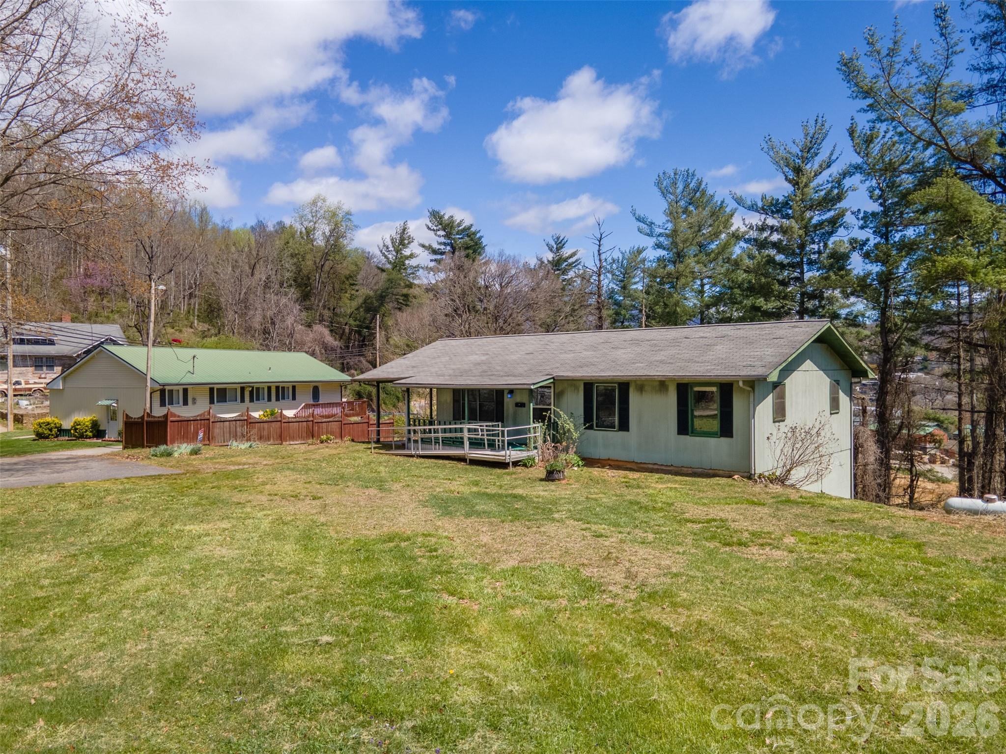 21 Queen Street Sylva, NC 28779 - Photo 26 of 45 a view of a house with a yard