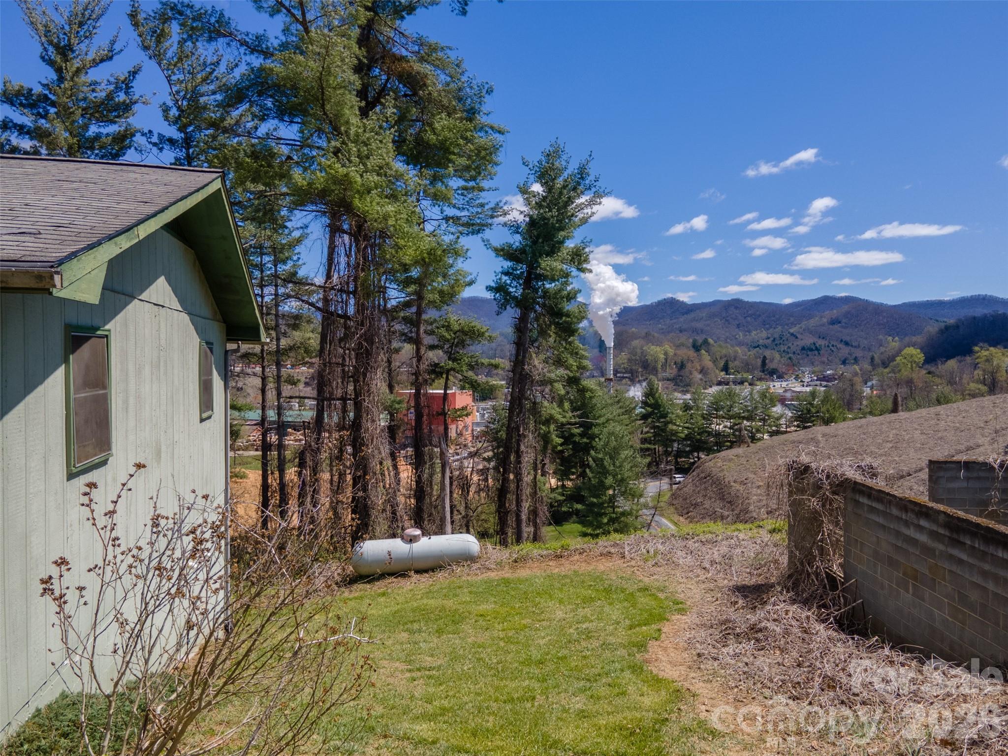 21 Queen Street Sylva, NC 28779 - Photo 29 of 45 a view of a house with swimming pool and sitting area
