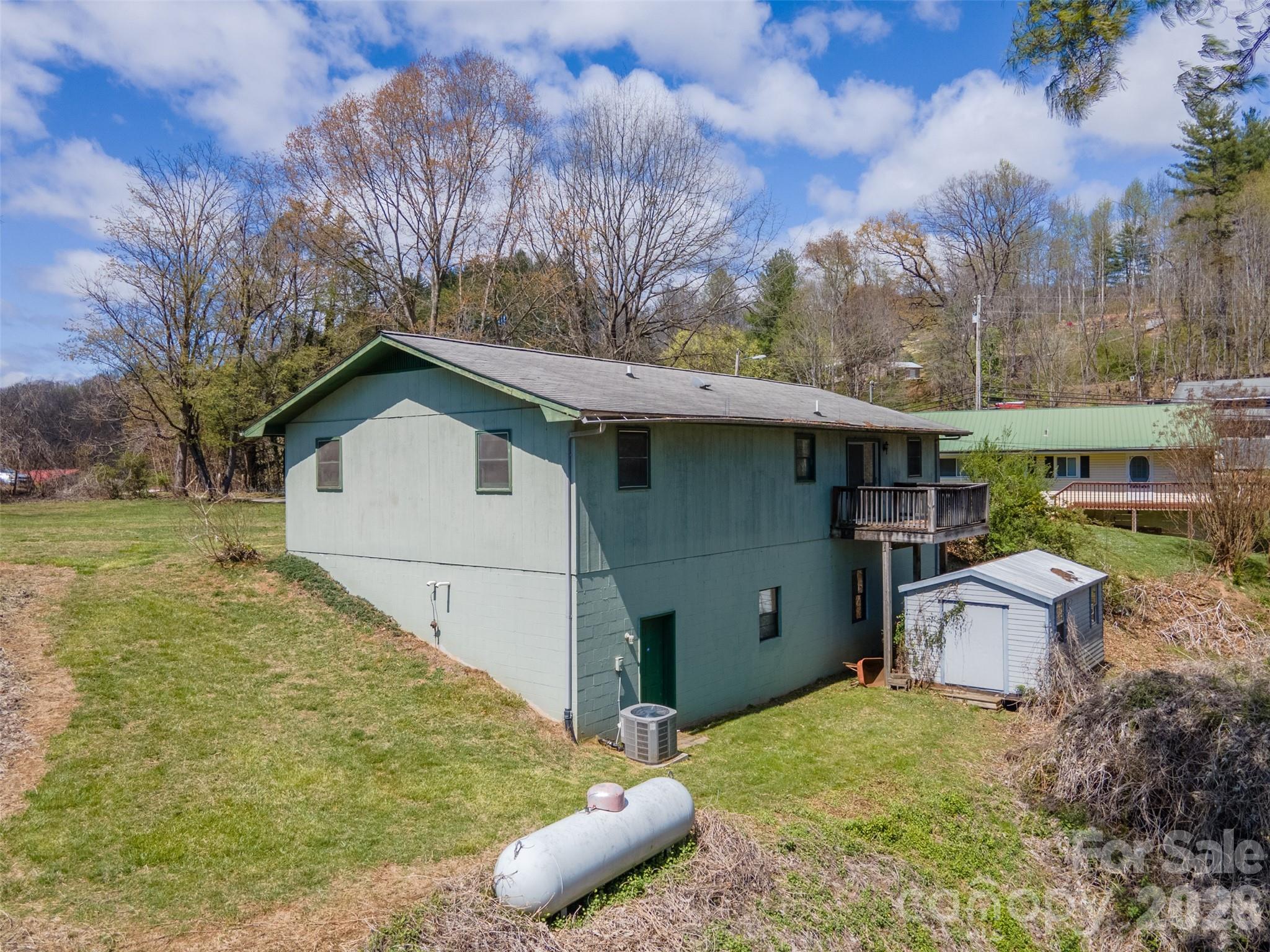 21 Queen Street Sylva, NC 28779 - Photo 30 of 45 a view of a backyard of the house