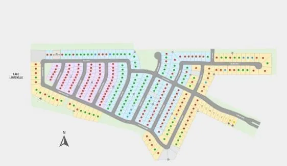 a view of a living room with furniture and floor to ceiling window