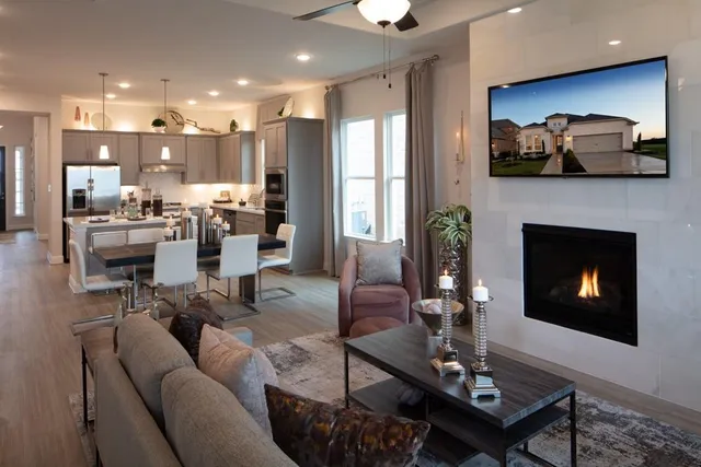 a large kitchen with a table and chairs