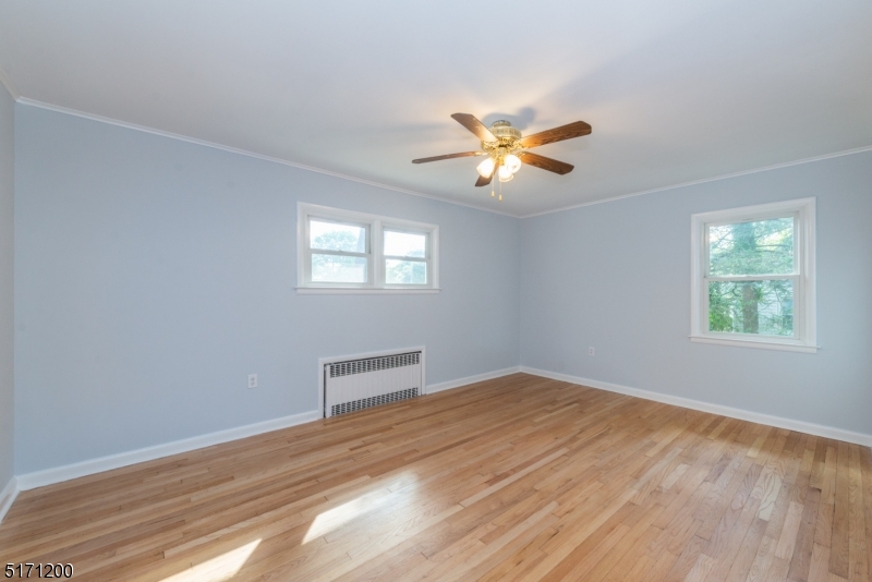 106 Fieldcrest Road Parsippany, NJ 07054 - Photo 13 of 18 a view of room with a ceiling fan and window