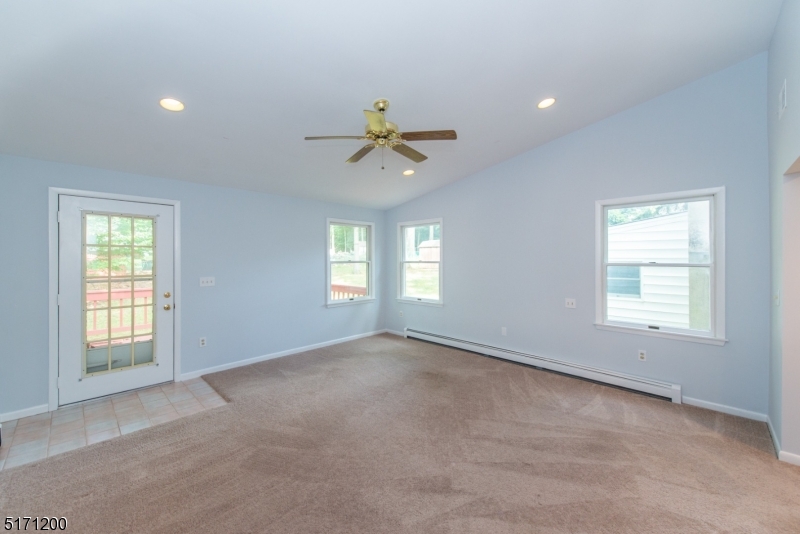 106 Fieldcrest Road Parsippany, NJ 07054 - Photo 14 of 18 a view of an empty room with a window