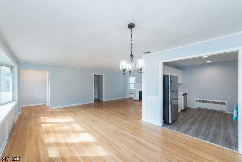 106 Fieldcrest Road Parsippany, NJ 07054 - Photo 2 of 18 a view of a livingroom with wooden floor