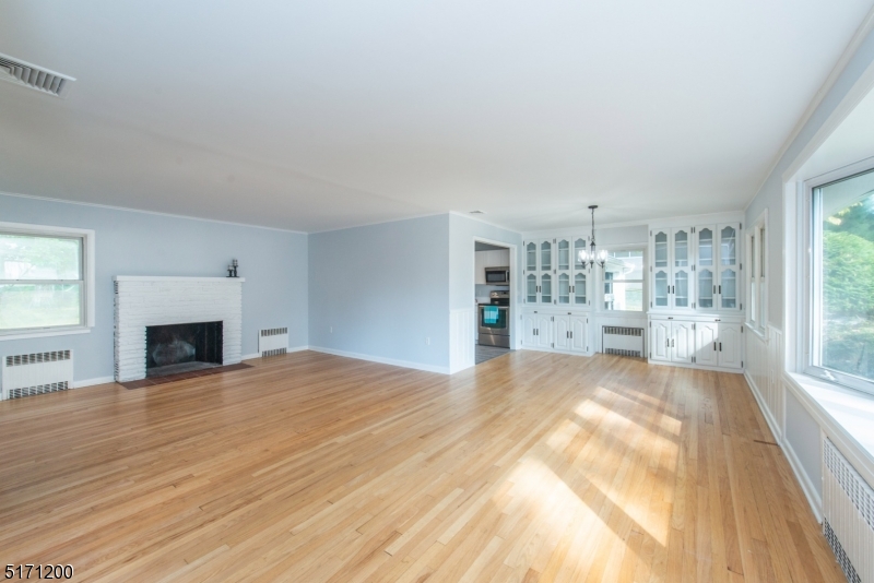 106 Fieldcrest Road Parsippany, NJ 07054 - Photo 4 of 18 a view of livingroom with a fireplace