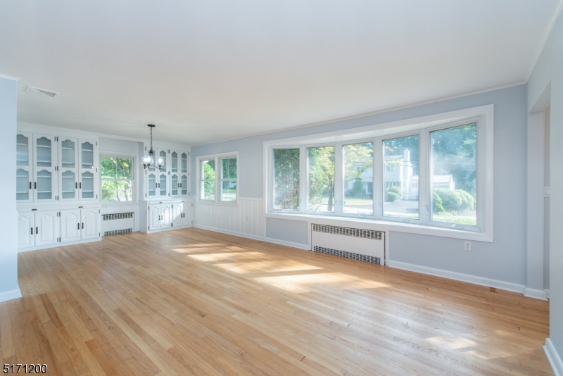 106 Fieldcrest Road Parsippany, NJ 07054 - Photo 5 of 18 a view of an empty room with a window