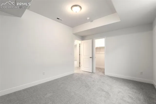 a bathroom with a toilet and bathtub