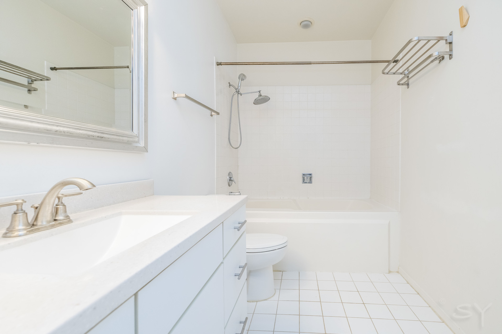 811 South Lytle Street, Unit 213 Chicago, IL 60607 - Photo 16 of 21 a bathroom with a sink a toilet and shower