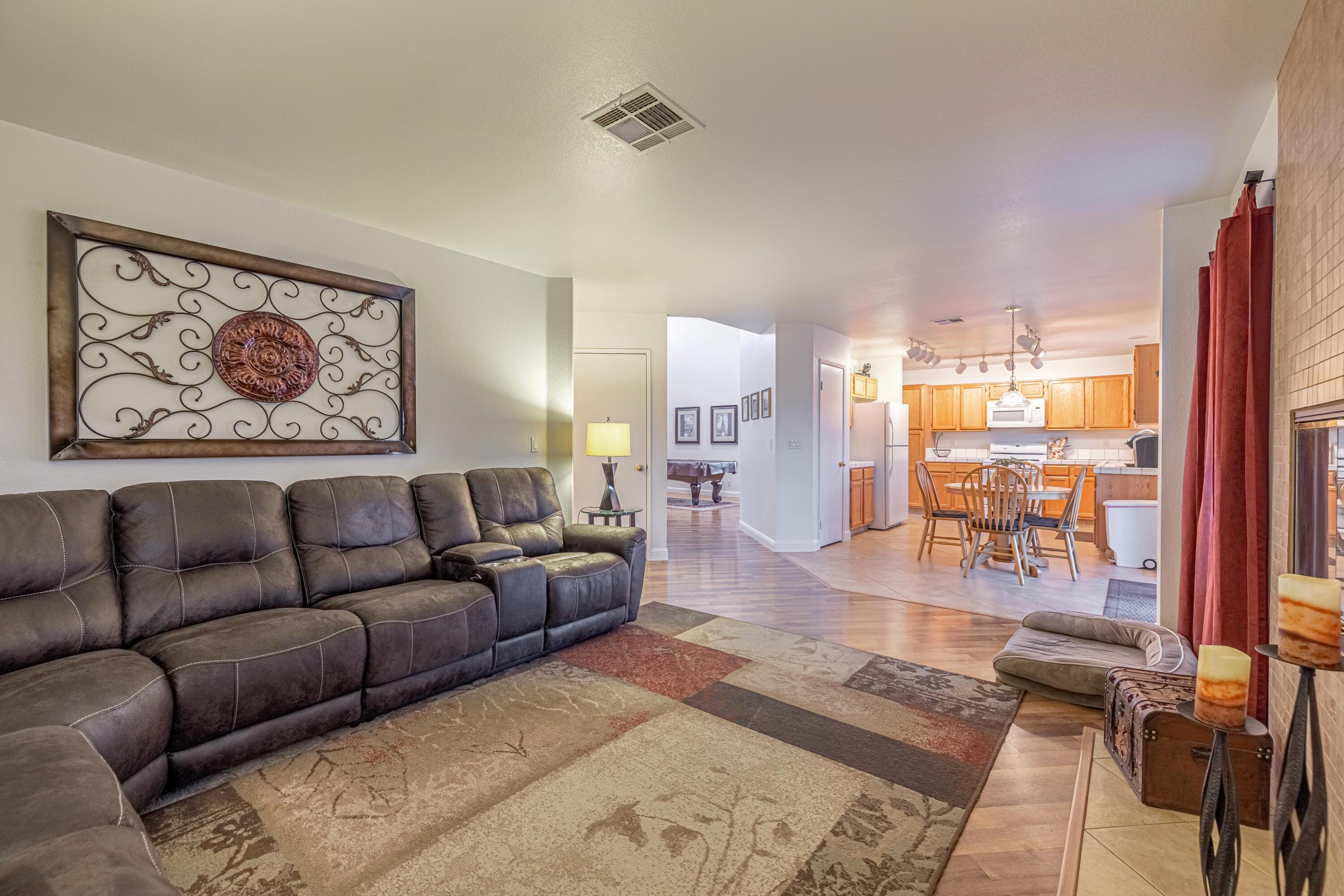 44220 Encanto Way Lancaster, CA 93536 - Photo 14 of 45 a living room with furniture and a large window