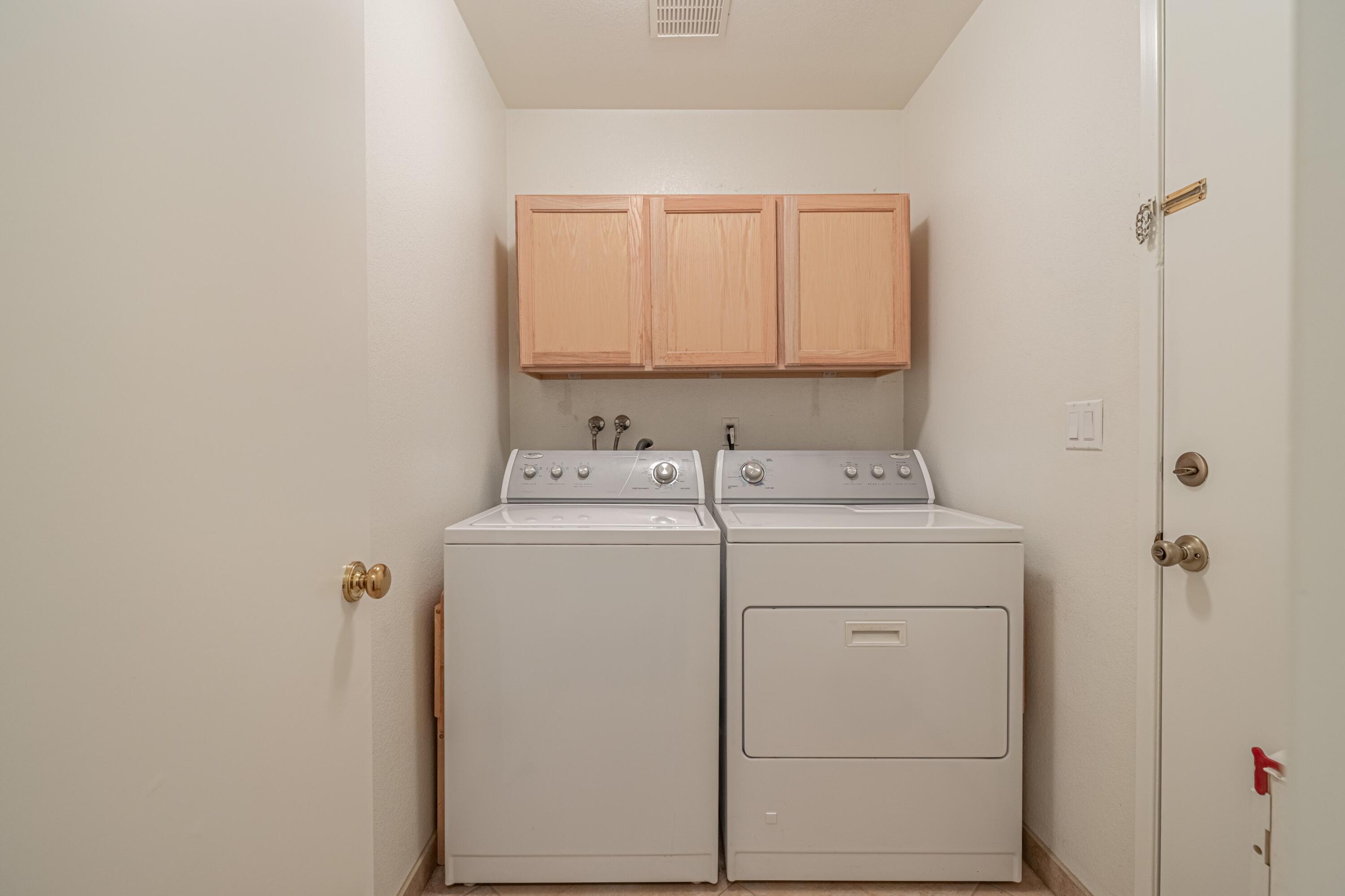 44220 Encanto Way Lancaster, CA 93536 - Photo 16 of 45 a utility room with dryer and washer