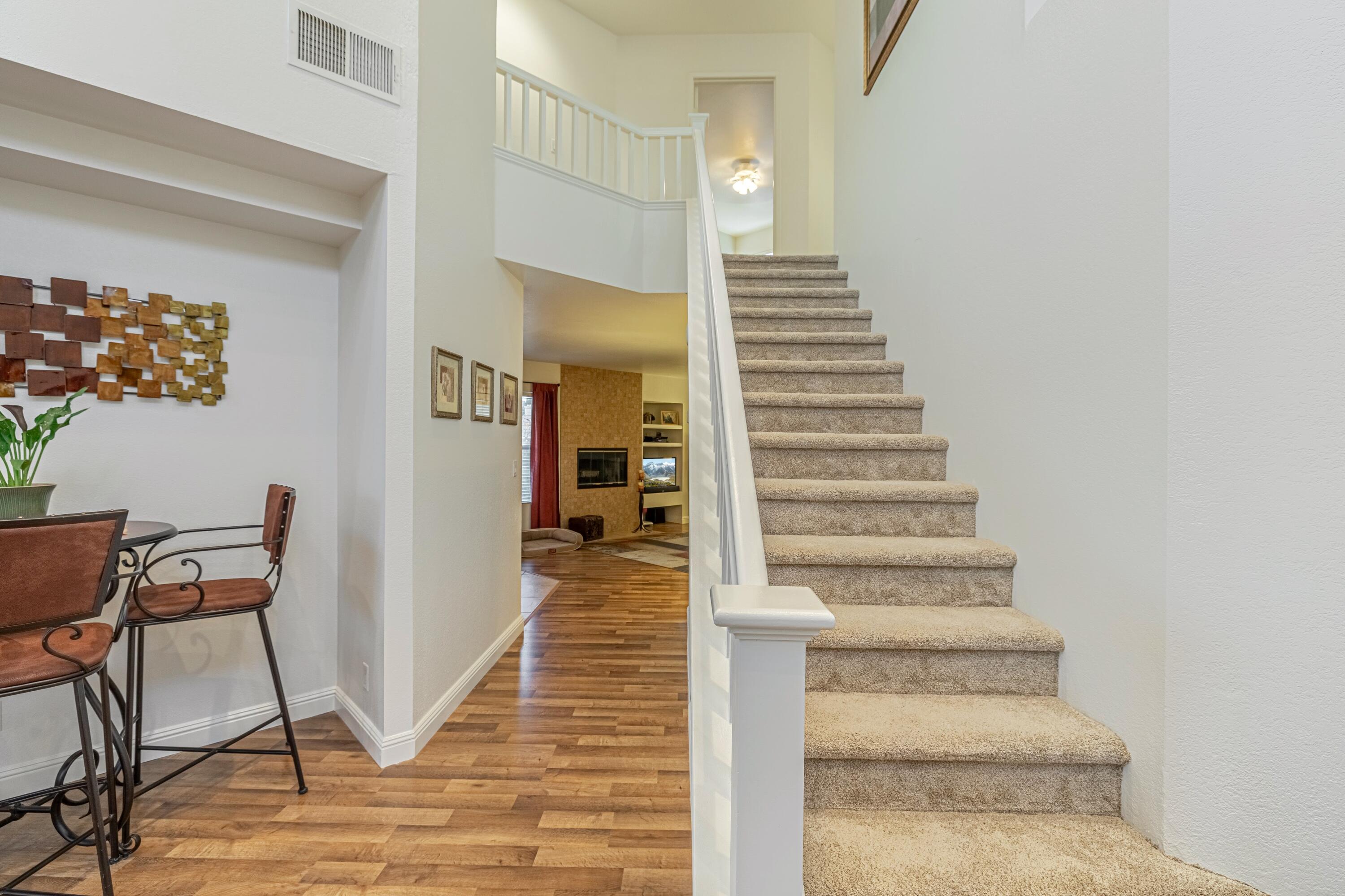 44220 Encanto Way Lancaster, CA 93536 - Photo 17 of 45 a view of entryway and hall with wooden floor