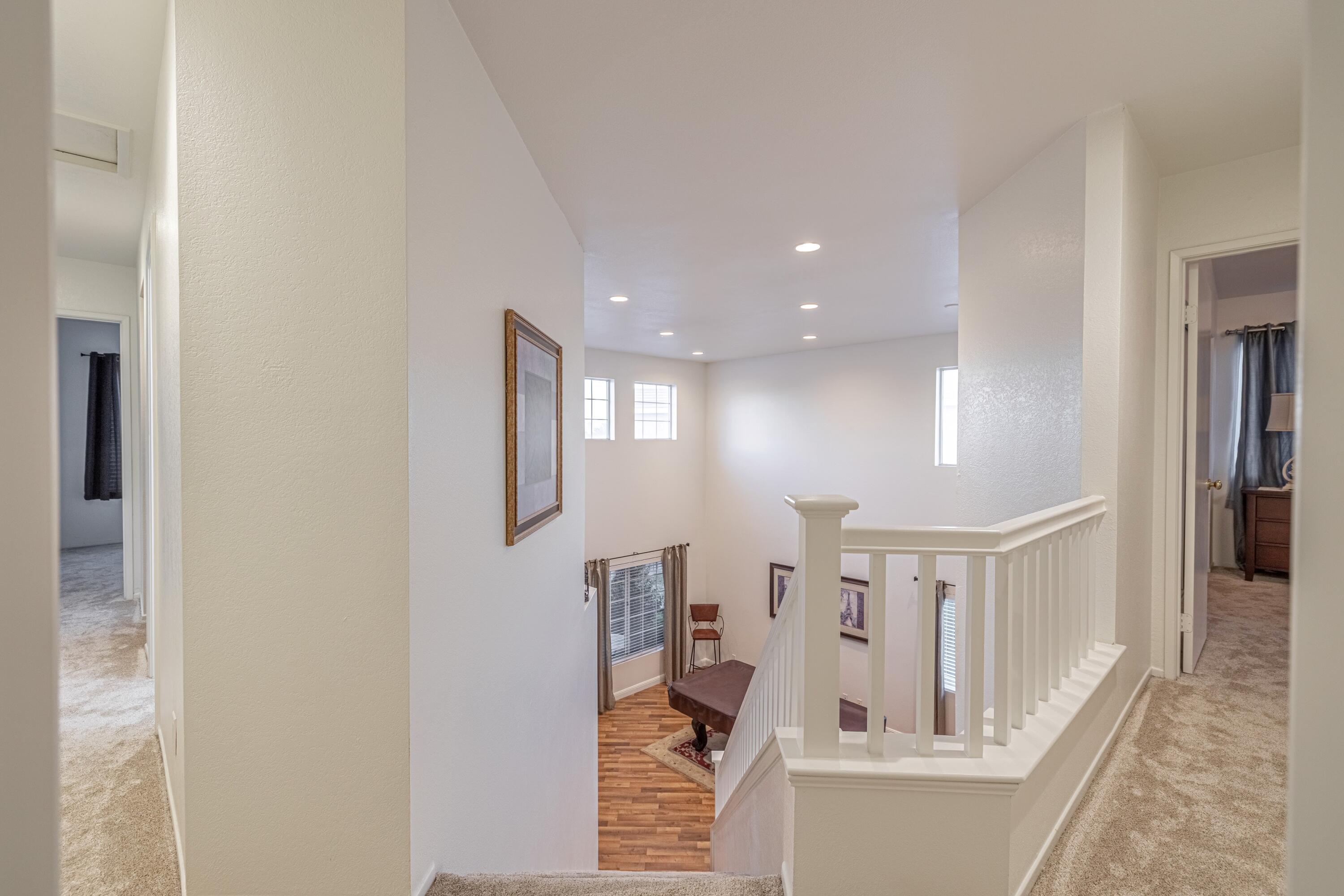 44220 Encanto Way Lancaster, CA 93536 - Photo 18 of 45 a view of entryway and hall with wooden floor