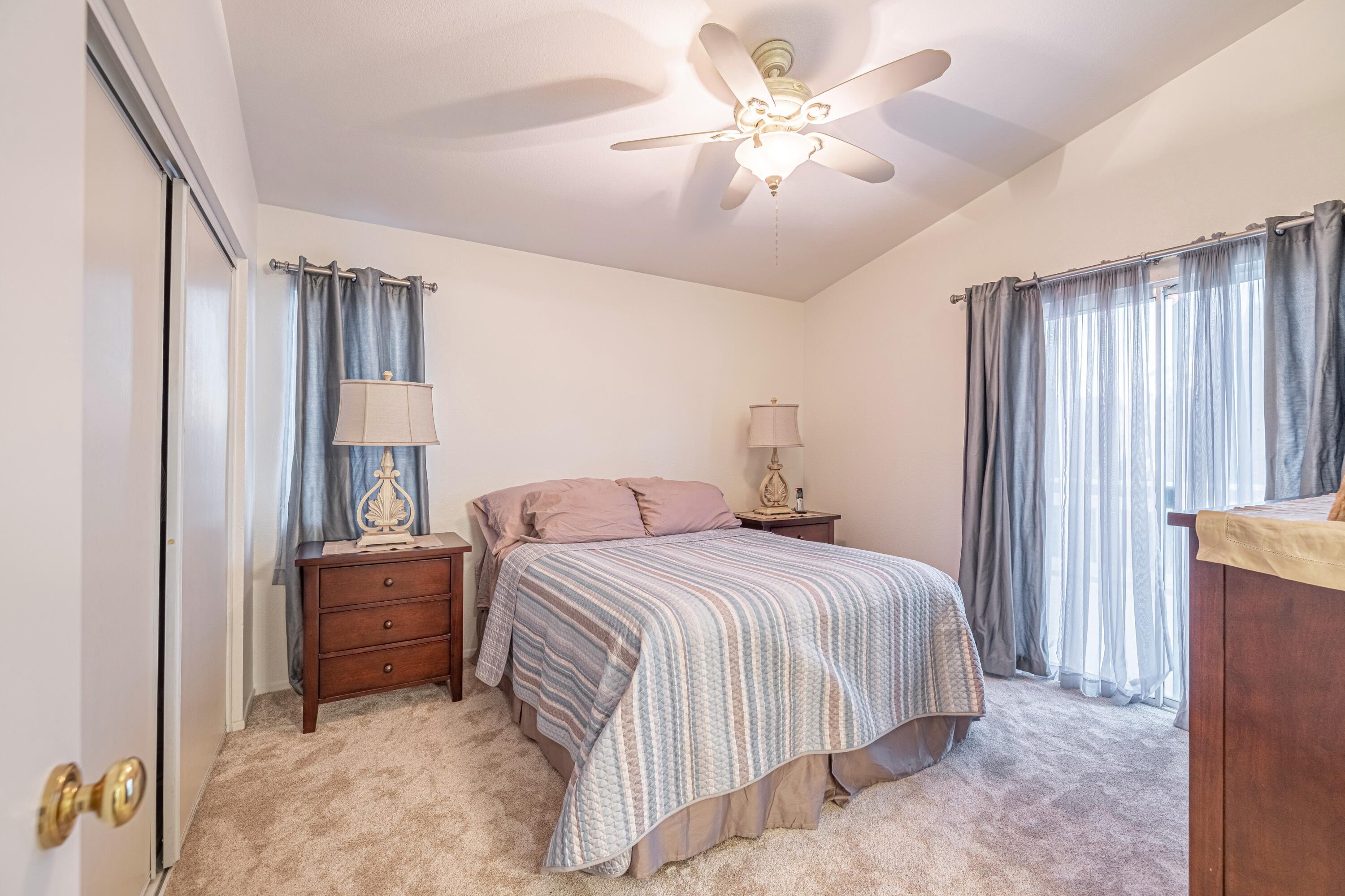44220 Encanto Way Lancaster, CA 93536 - Photo 19 of 45 a bedroom with a bed dresser and a window