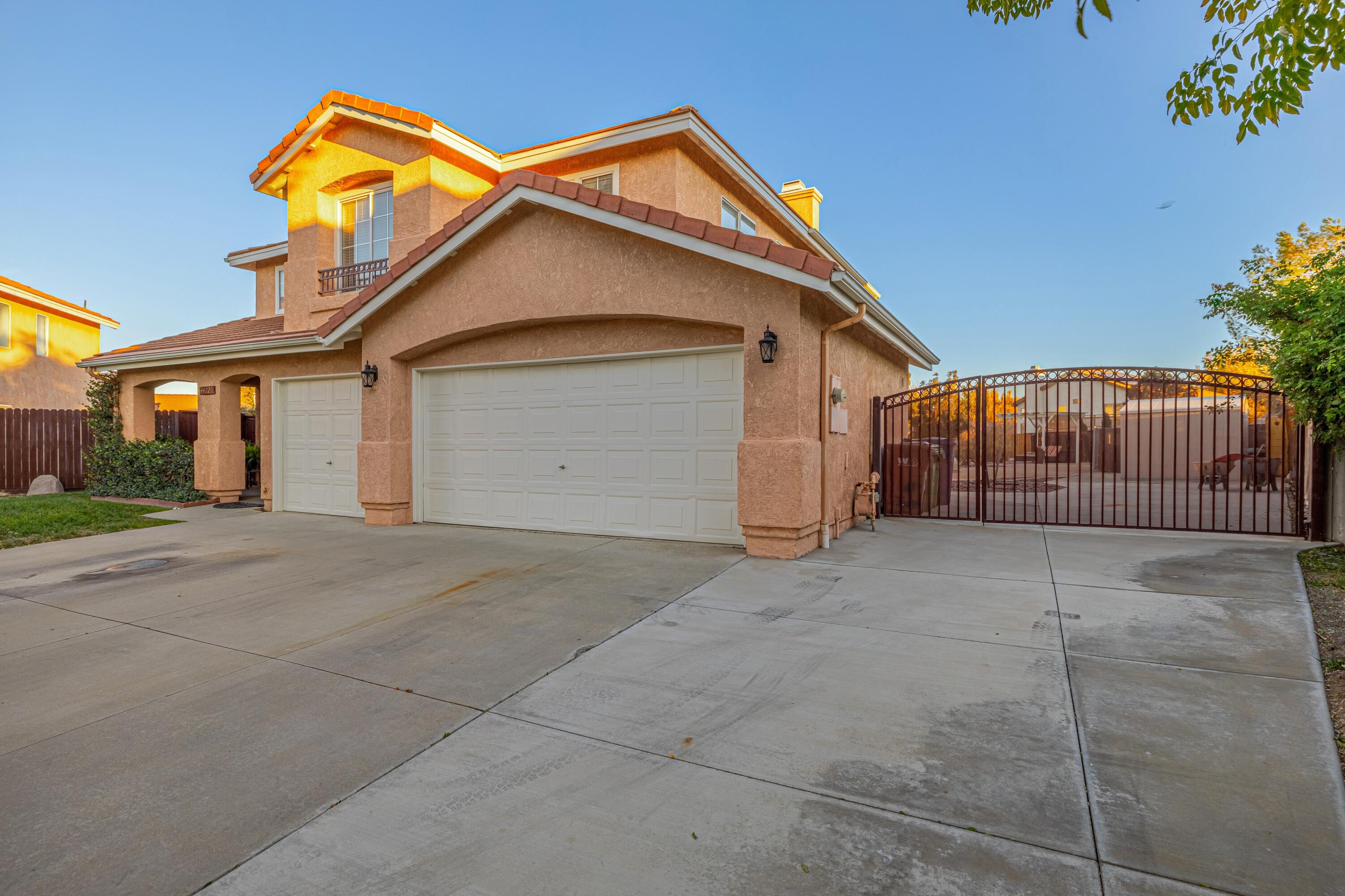 44220 Encanto Way Lancaster, CA 93536 - Photo 2 of 45 a view of garage and utility house