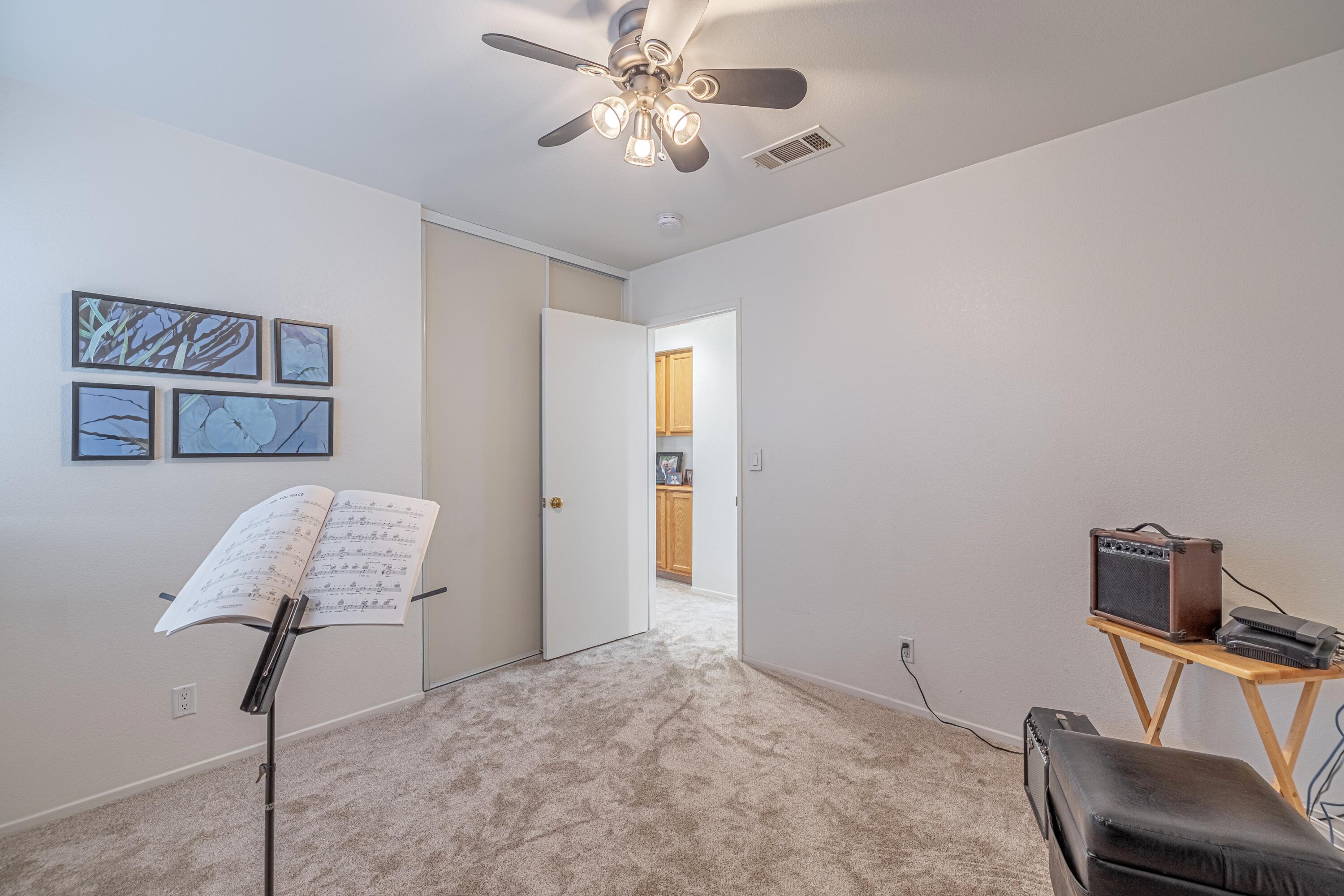 44220 Encanto Way Lancaster, CA 93536 - Photo 28 of 45 a view of a workspace with furniture and a chair