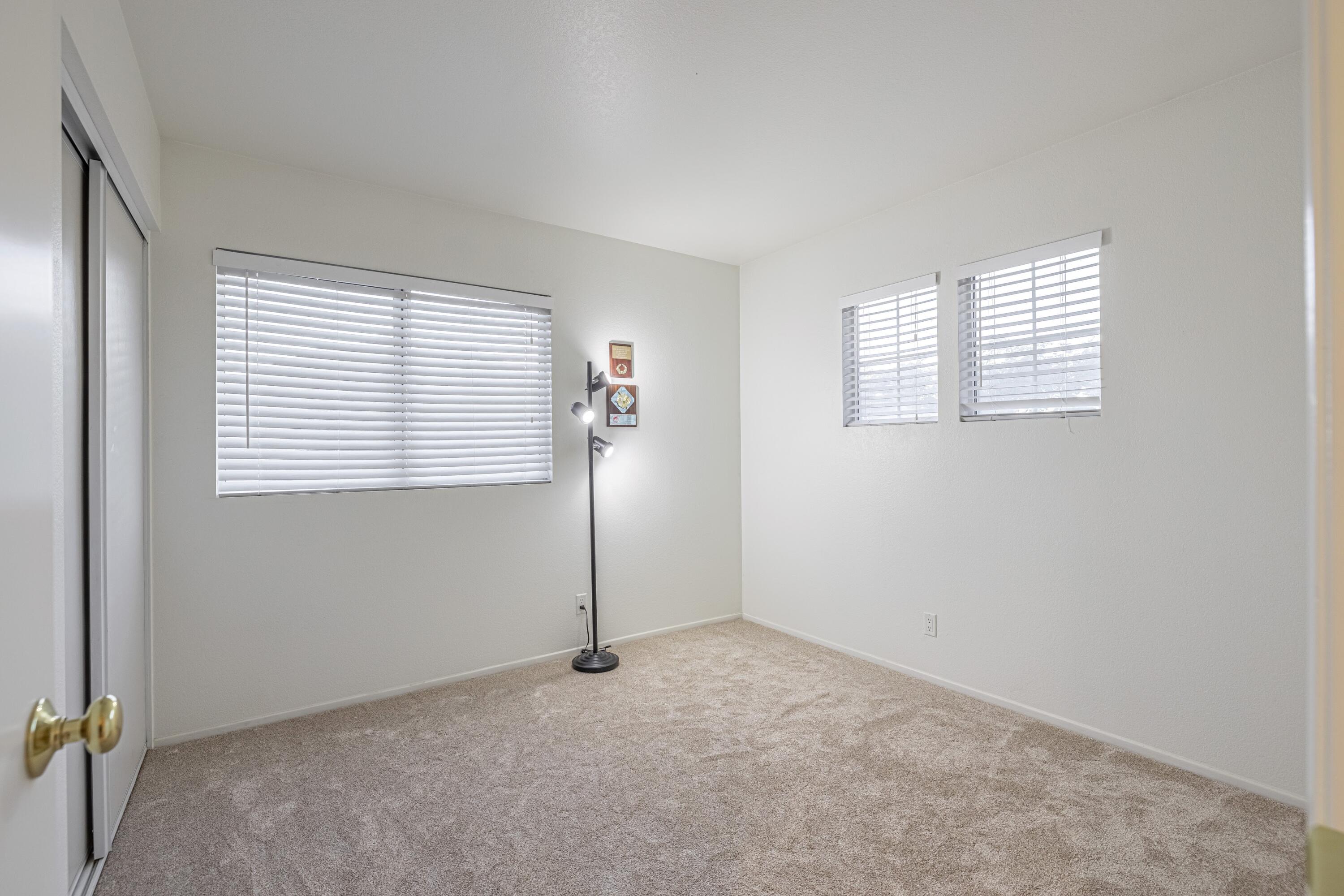 44220 Encanto Way Lancaster, CA 93536 - Photo 30 of 45 an empty room with windows