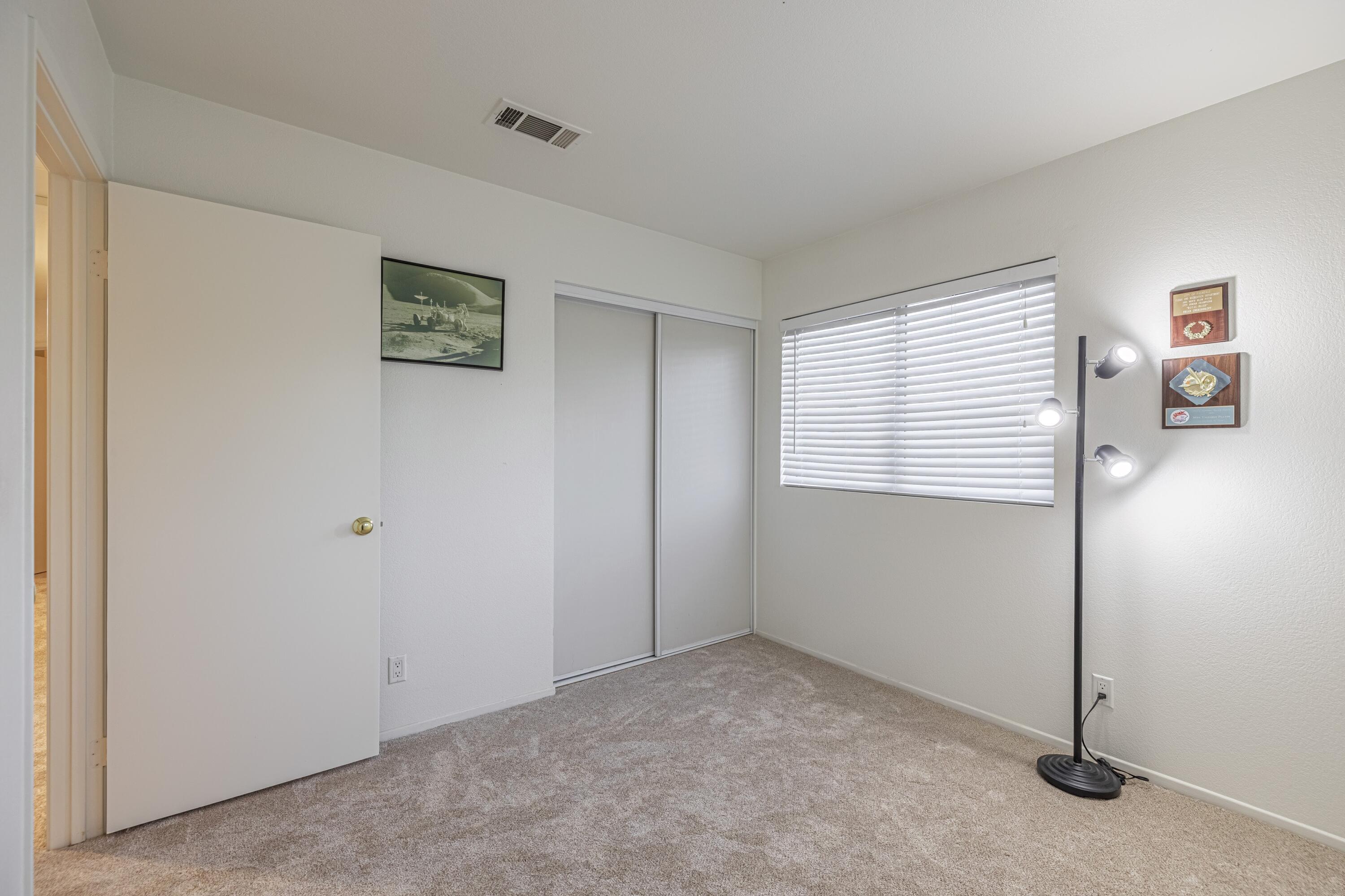 44220 Encanto Way Lancaster, CA 93536 - Photo 31 of 45 a view of an empty room with a window