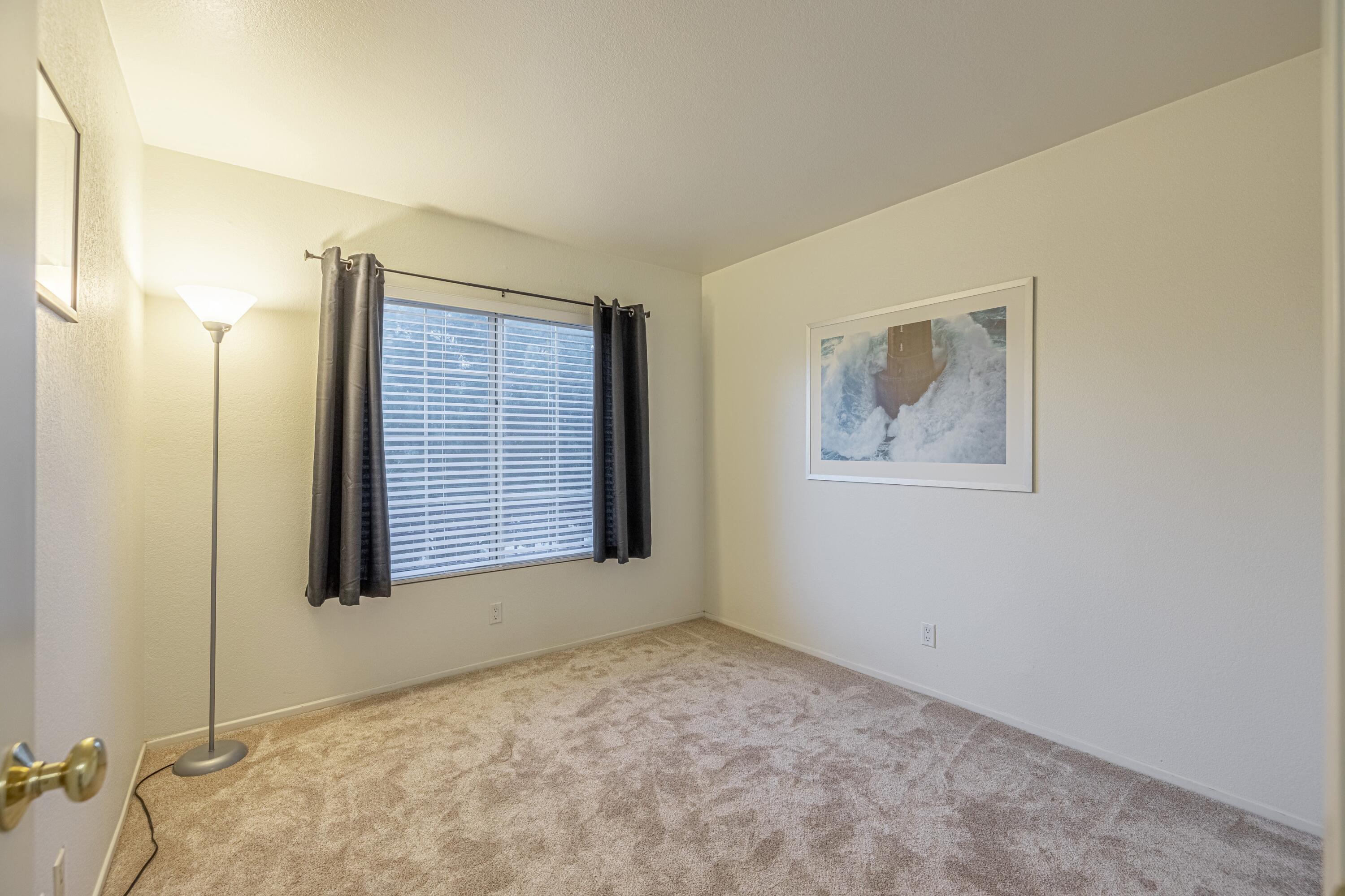 44220 Encanto Way Lancaster, CA 93536 - Photo 32 of 45 a view of an empty room with a window