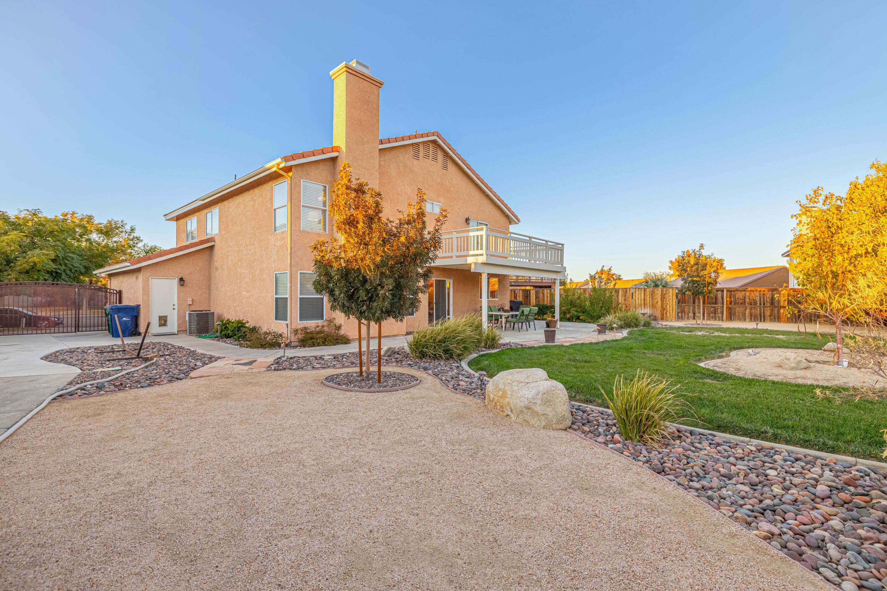 44220 Encanto Way Lancaster, CA 93536 - Photo 34 of 45 a view of a house with a yard