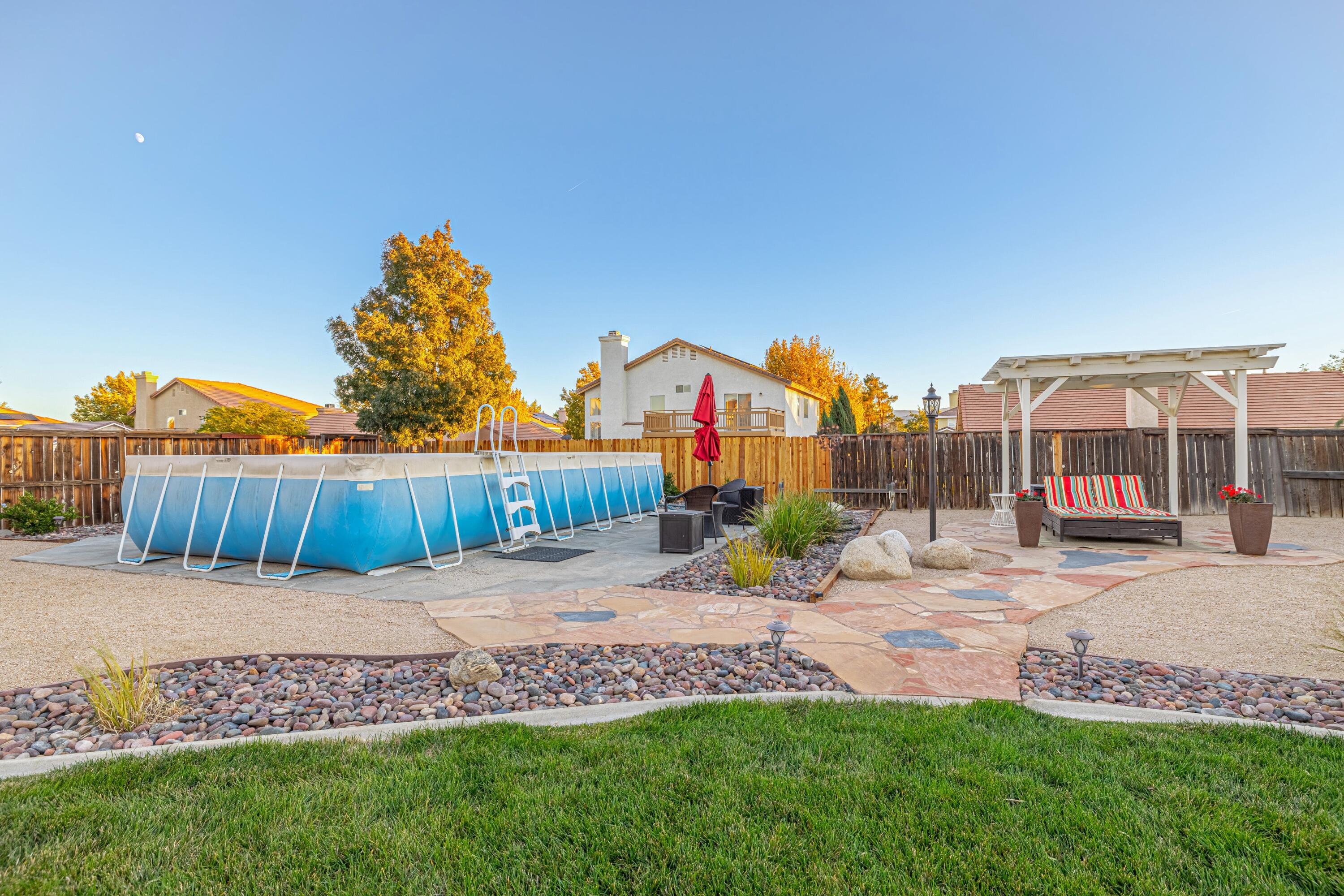 44220 Encanto Way Lancaster, CA 93536 - Photo 41 of 45 a view of a street with a house in the background