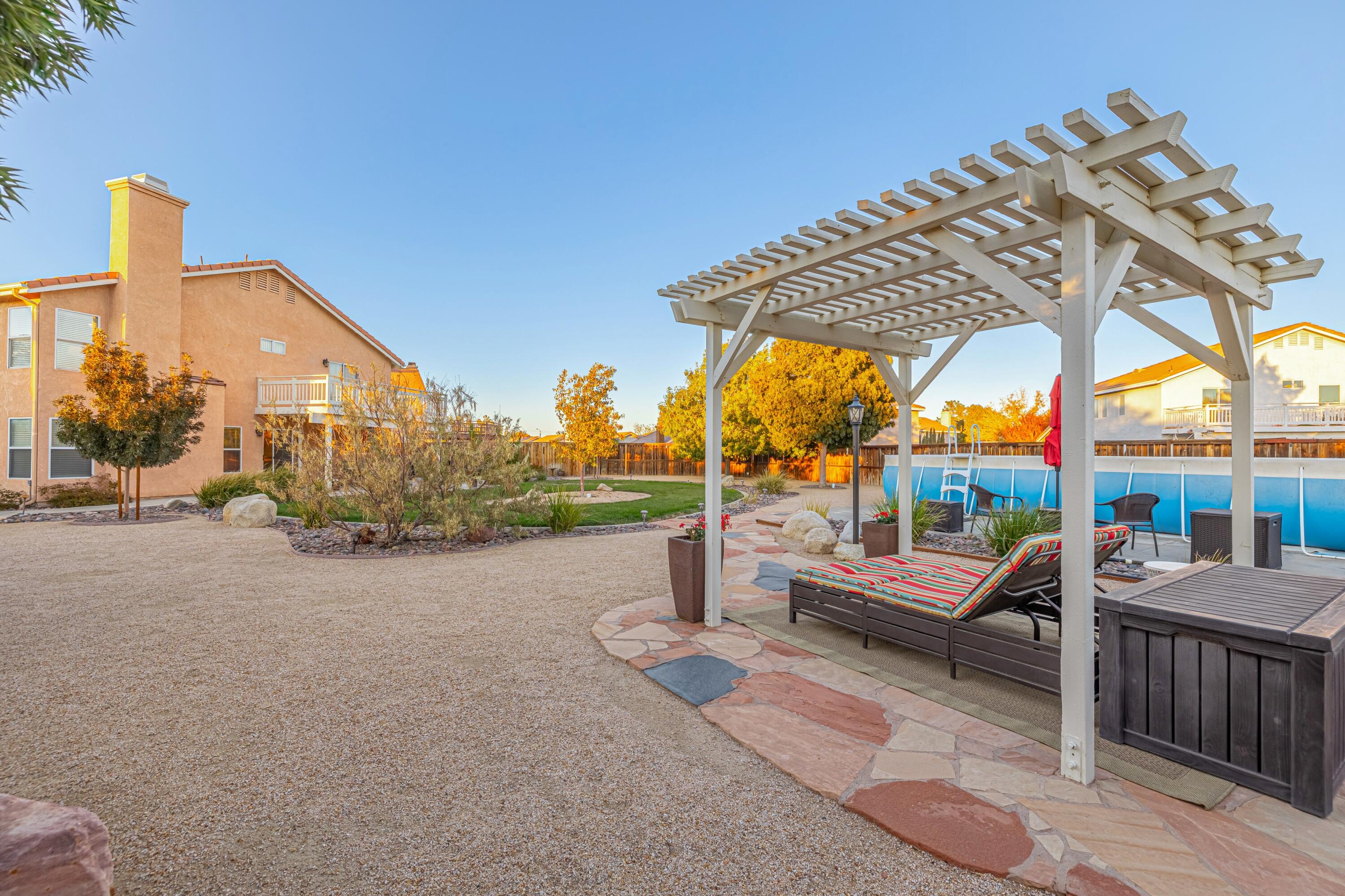44220 Encanto Way Lancaster, CA 93536 - Photo 43 of 45 a view of a swimming pool with a patio