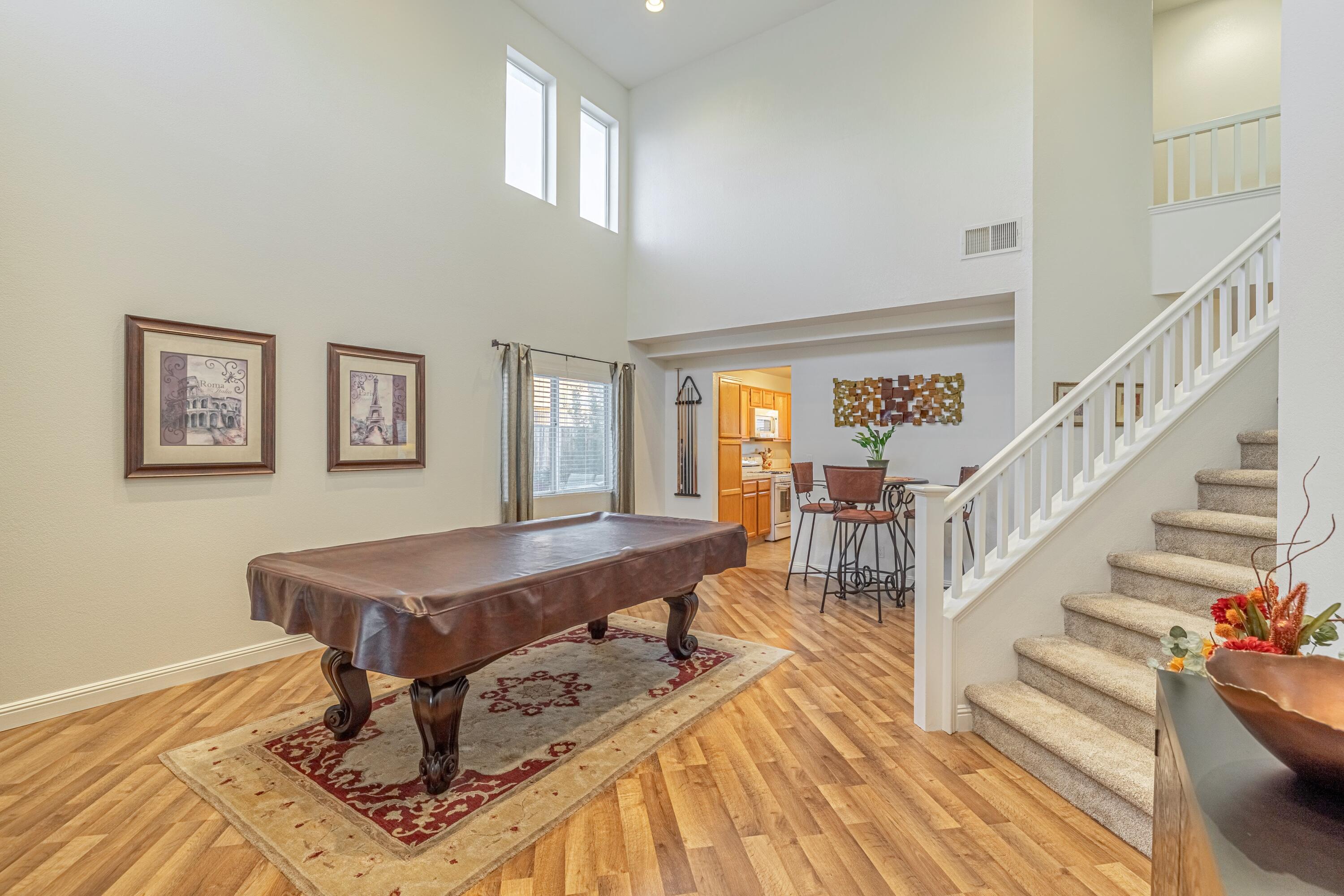 44220 Encanto Way Lancaster, CA 93536 - Photo 5 of 45 a living room with furniture and a table