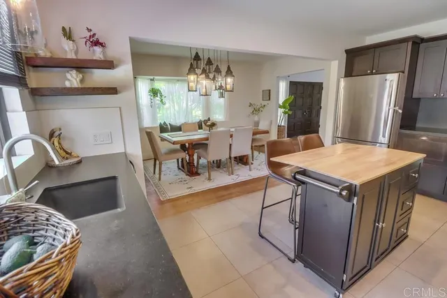 a bathroom with a double vanity sink mirror double and shower