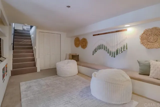a view of an chairs and table in patio