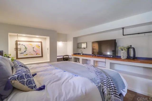 a view of a backyard with chair and table