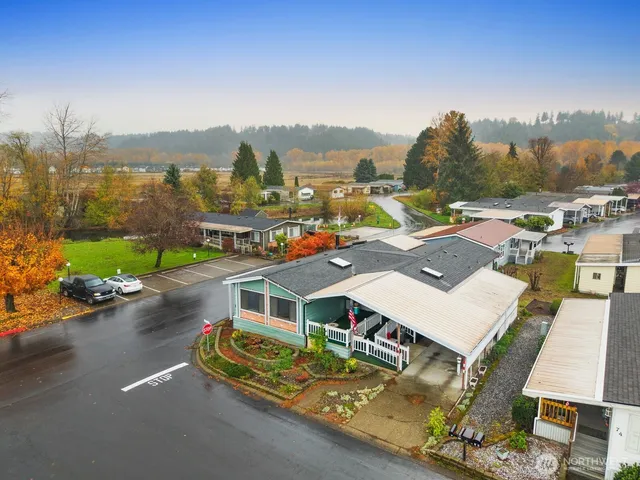 a view of lake with green space