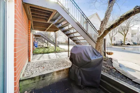 a view of balcony with furniture
