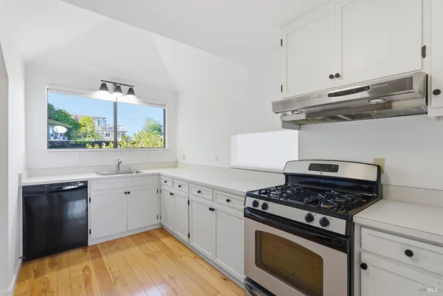 a view of an empty room with a balcony