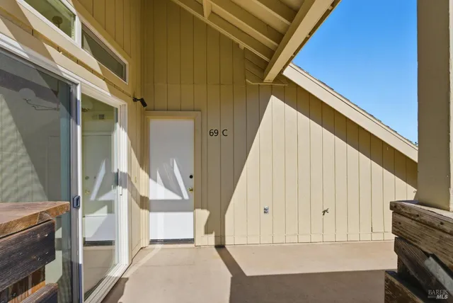 a view of a hallway with white walls