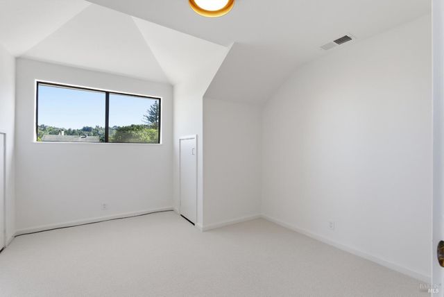 a kitchen with a stove and a sink