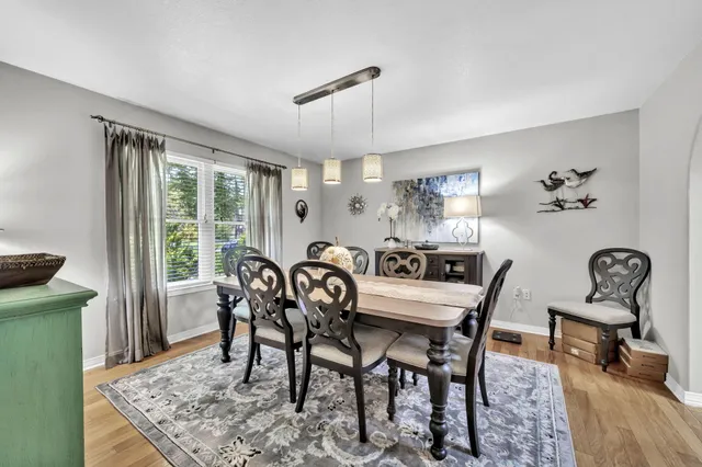 a view of a dining room with furniture