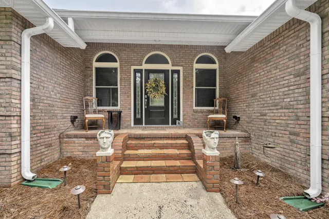 a front view of a house with a porch